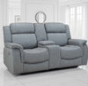 Gray reclining sofa in a room with white walls and a mirror.