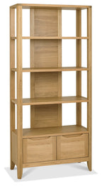 Tall oak lacquer finish open display shelving unit by Bentley Designs, showcasing multiple shelves for storage and display.