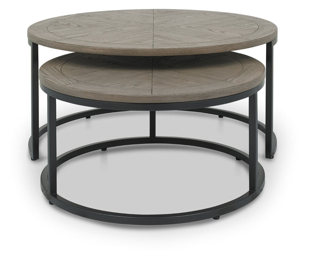Pair of silver grey wood round nest coffee tables by Bentley Designs, showcasing smooth surfaces and modern design.