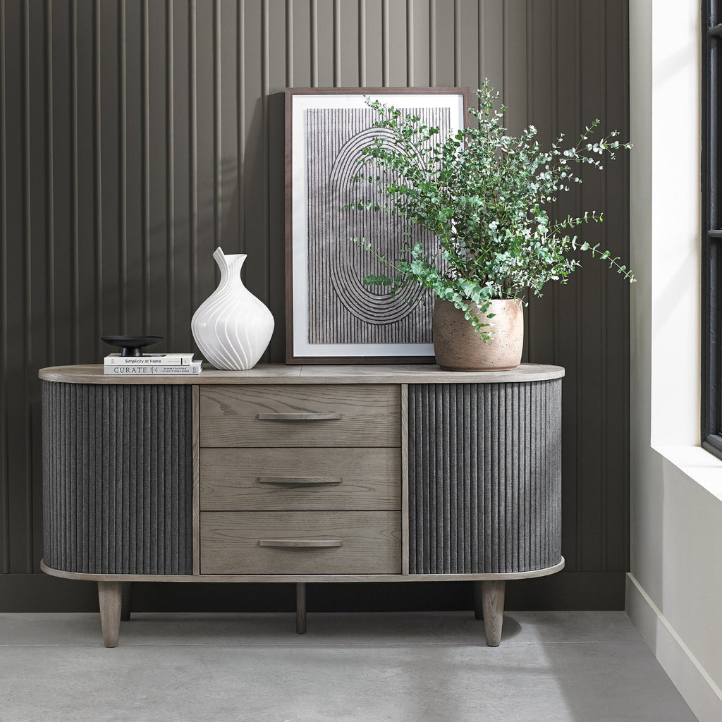 Silver and grey wooden sideboard with two sliding doors, designed by Bentley Designs, showcasing a modern storage solution.
