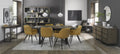 Weathered oak extending dining table with six yellow fabric Bentley Designs chairs, perfect for versatile family meals.