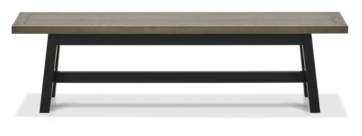 Weathered Oak dining table set with two grey fabric chairs and a matching bench, from Bentley Designs, showing the table and seating arrangement.
