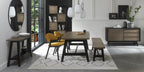 Weathered oak dining set by Bentley Designs with a table, two side chairs, and a bench, showcasing a rustic wood finish.