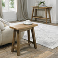 Rustic oak side table with a traditional design, featuring a side lamp and end table from Bentley Designs.