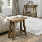 Rustic oak side table with a traditional design, featuring a side lamp and end table from Bentley Designs.