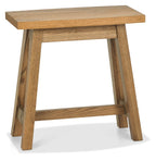 Rustic oak side table with a traditional design, featuring a side lamp and end table by Bentley Designs.