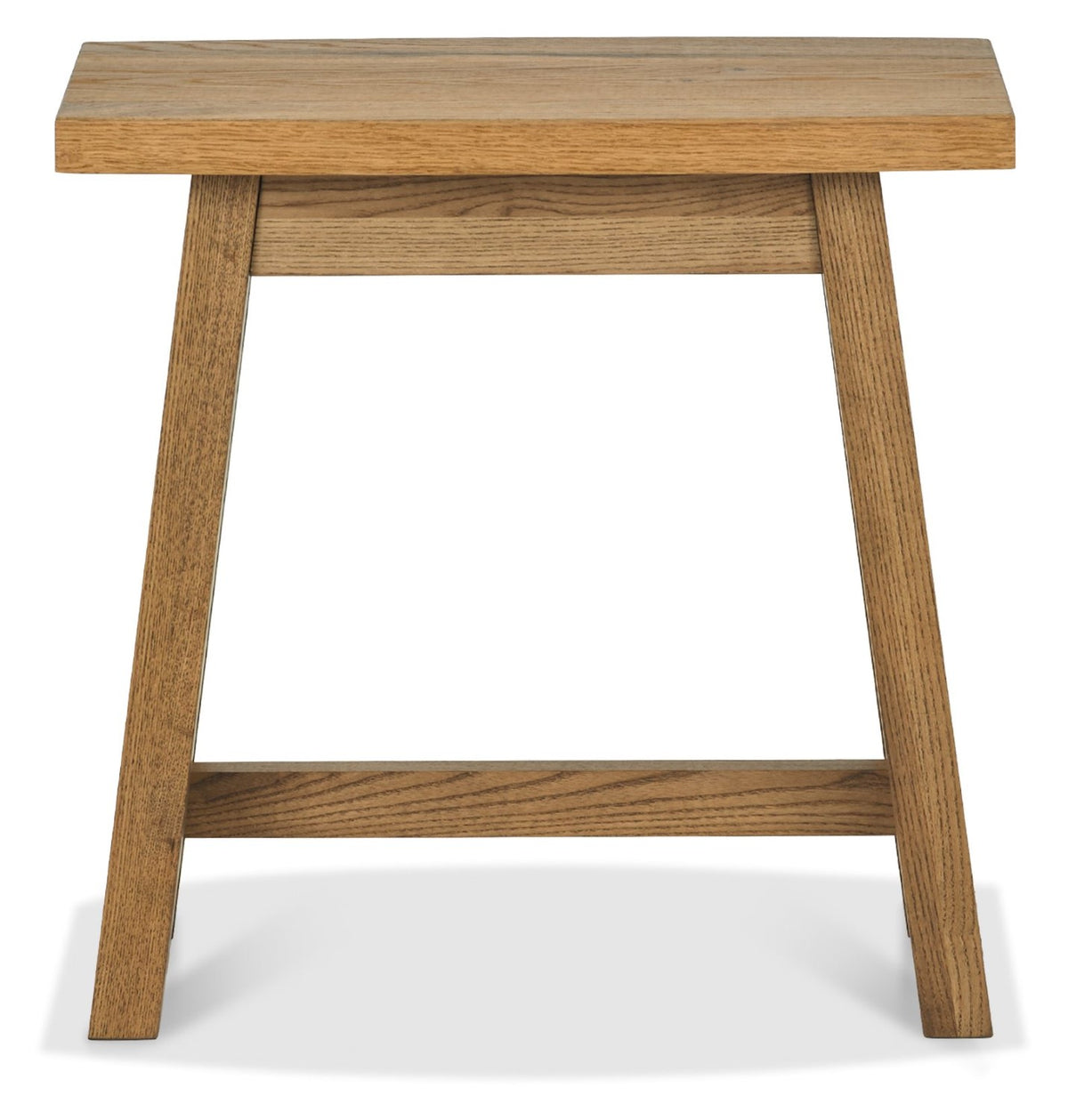Rustic oak side table by Bentley Designs with a traditional style, featuring a smooth wooden surface and sturdy legs.