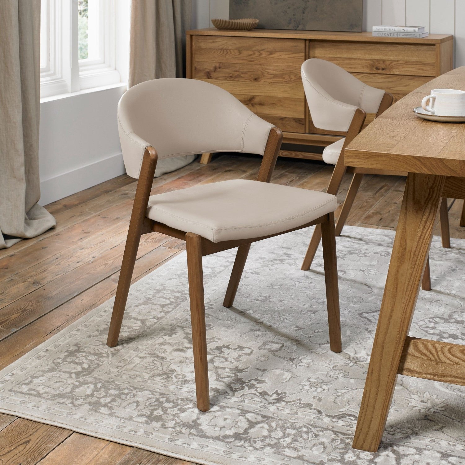Ivory Leather Curved Retro Dining Chair Rustic Oak Legs