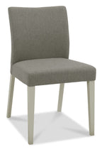 Bentley Designs washed oak dining table set with four grey fabric chairs, modern table and chair set for dining room.
