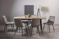 Weathered Oak dining table with six grey velvet chairs from Bentley Designs, stylish table and chair set for modern dining rooms.