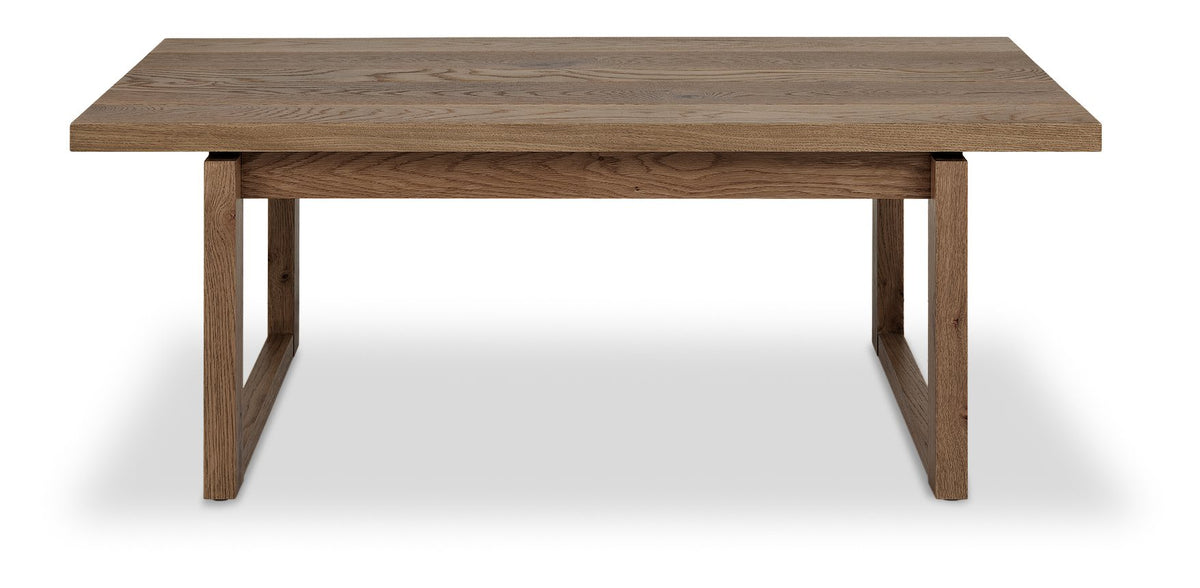 Dark oak Bentley Designs coffee table with wire brushed finish, showcasing a sleek rectangular wooden surface and sturdy legs.