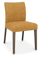 Pair of mustard yellow fabric dining chairs with dark oak legs by Bentley Designs, showcasing plush upholstery and modern design.
