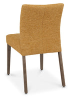 Pair of mustard yellow fabric dining chairs with dark oak legs by Bentley Designs, showcasing modern and stylish seating.