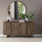 Dark oak Bentley Designs 4-door wide sideboard with two shelves, showcasing a sleek, modern storage piece with ample space.