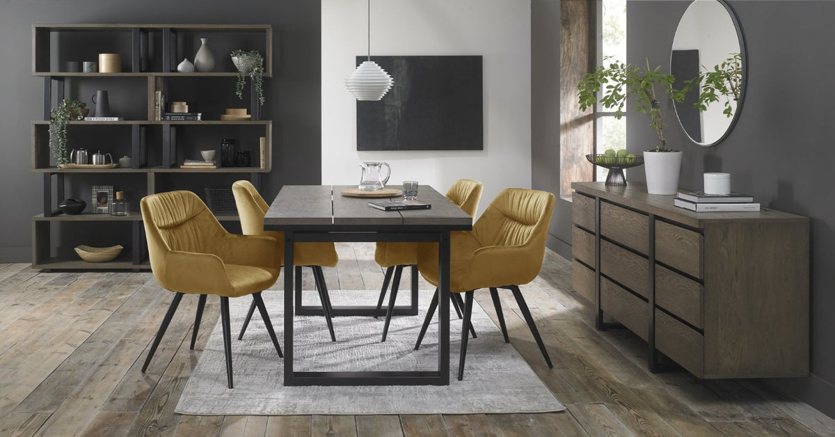 Yellow velvet dining arm chair with pleated back pattern by Bentley Designs, showcasing plush upholstery and elegant design.