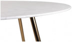 White marble glass round dining table with gold legs from Bentley Designs, showcasing a modern and elegant dining room setup.
