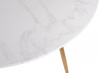 White marble glass round dining table with gold legs by Bentley Designs, showcasing a sleek modern design.