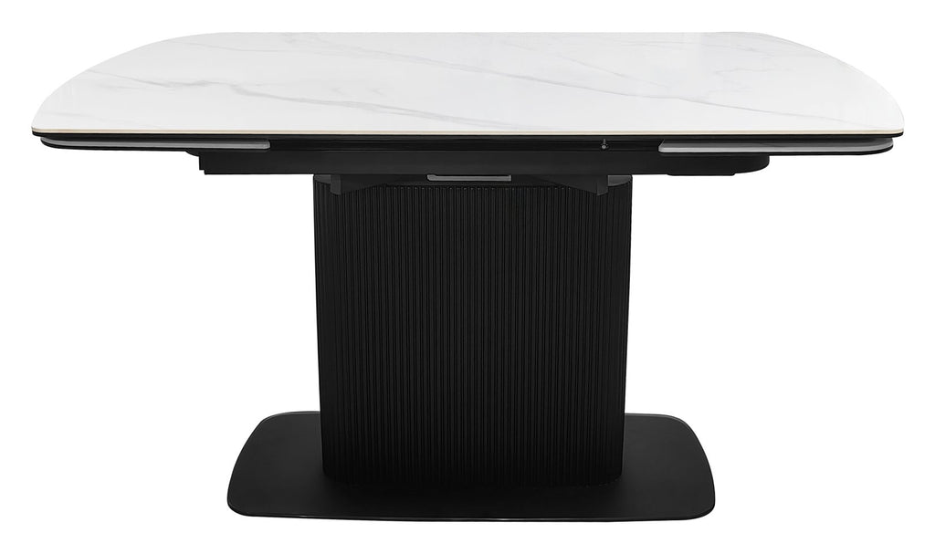 White gloss marble effect large extending dining table by Bentley Designs, showcasing a sleek, modern surface with sturdy legs.
