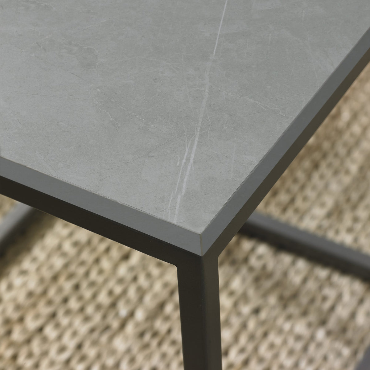 Matt grey marble effect coffee table with metal frame by Bentley Designs, showcasing sleek modern design and smooth surface.