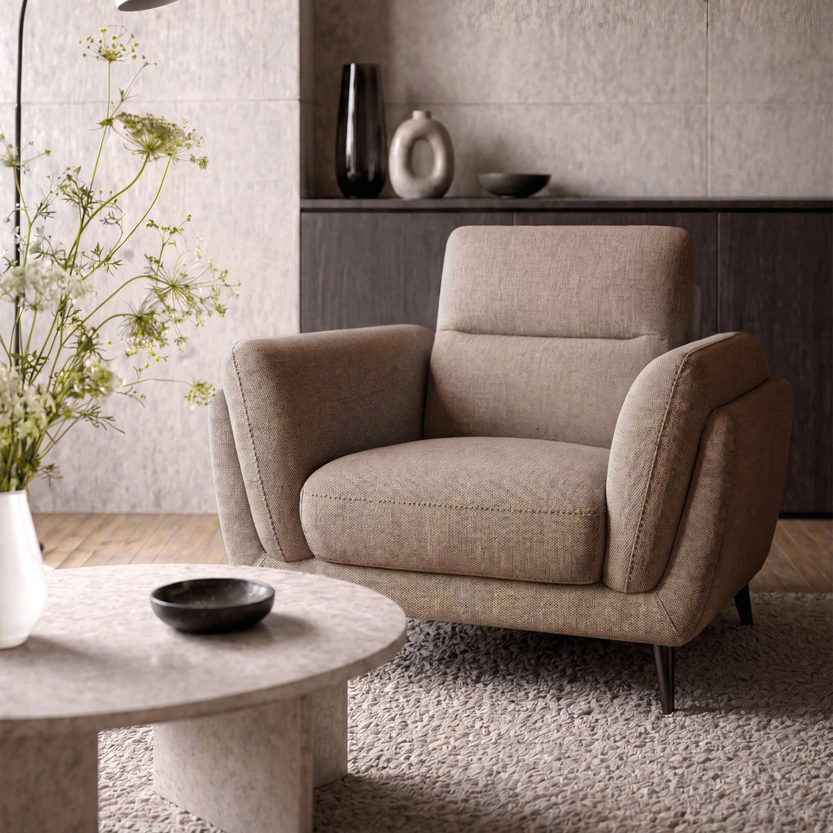Oatmeal fabric upholstered armchair with nickel legs from Bentley Designs, featuring a comfortable lounge chair style.