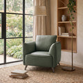 Green leather back armchair with cushion, nickel legs, from Bentley Designs, featuring a stylish lounge chair with comfortable padding.