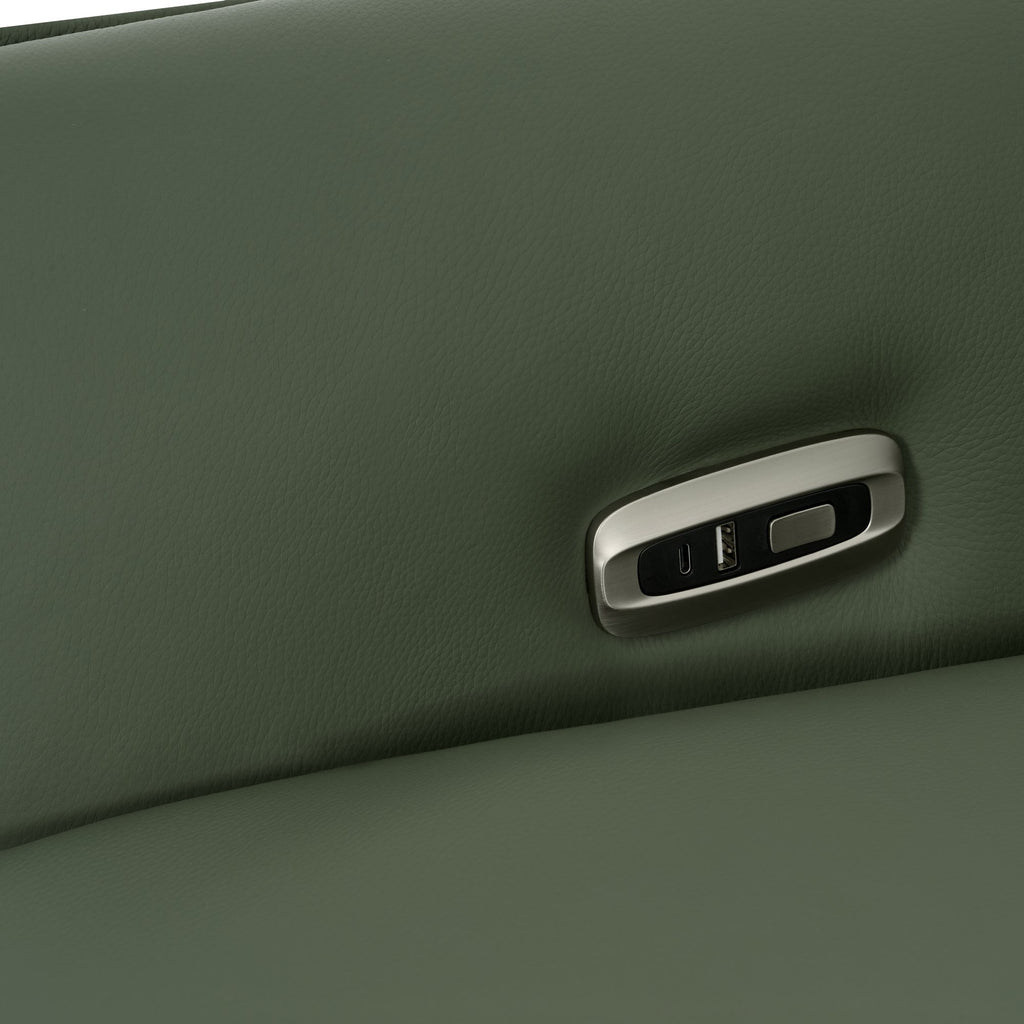 Green leather upholstered electric recliner armchair by Bentley Designs, featuring plush cushioning and a modern lounge chair design.