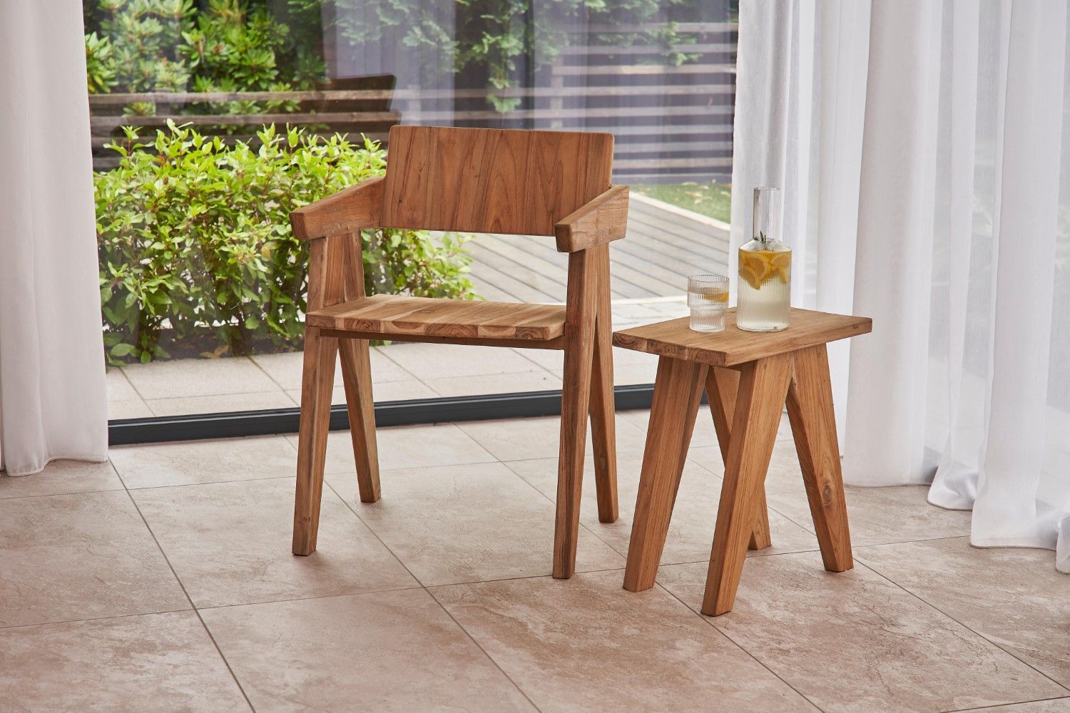 Natural Teak Wood Accent Chair with Angled Backrest and Sculpted Arm Design - Home Furniture Interiors