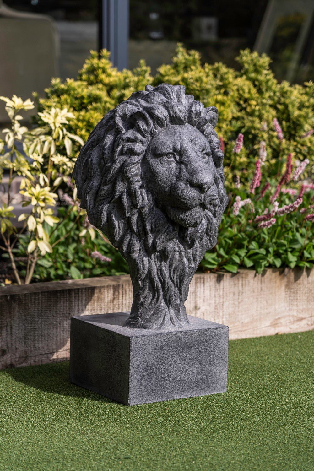 Regal Textured Lion Garden Ornament on Square Plinth