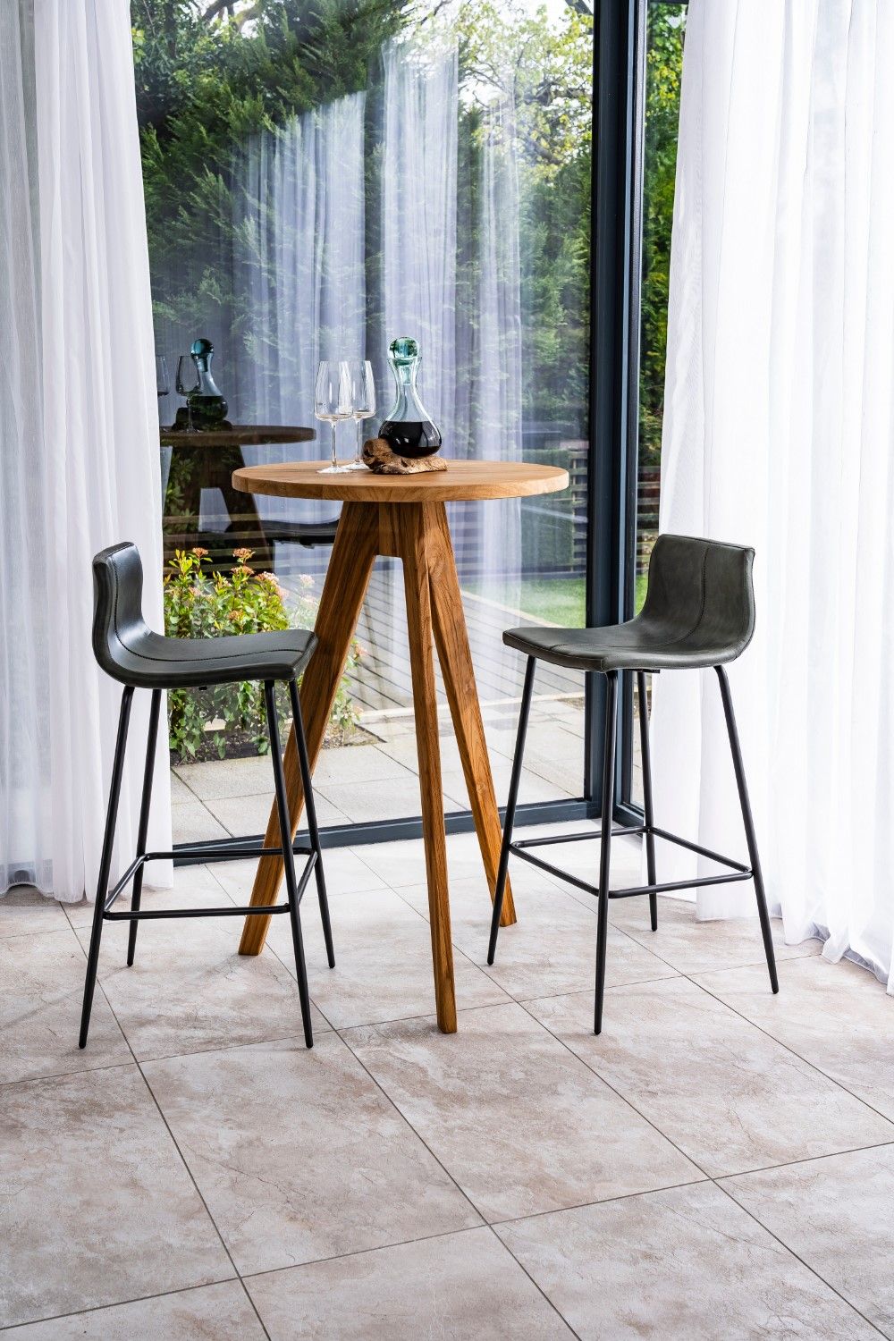 Modern Green Vegan Leather Bar Stool with Curved Seat and Black Steel Frame - Home Furniture Interiors