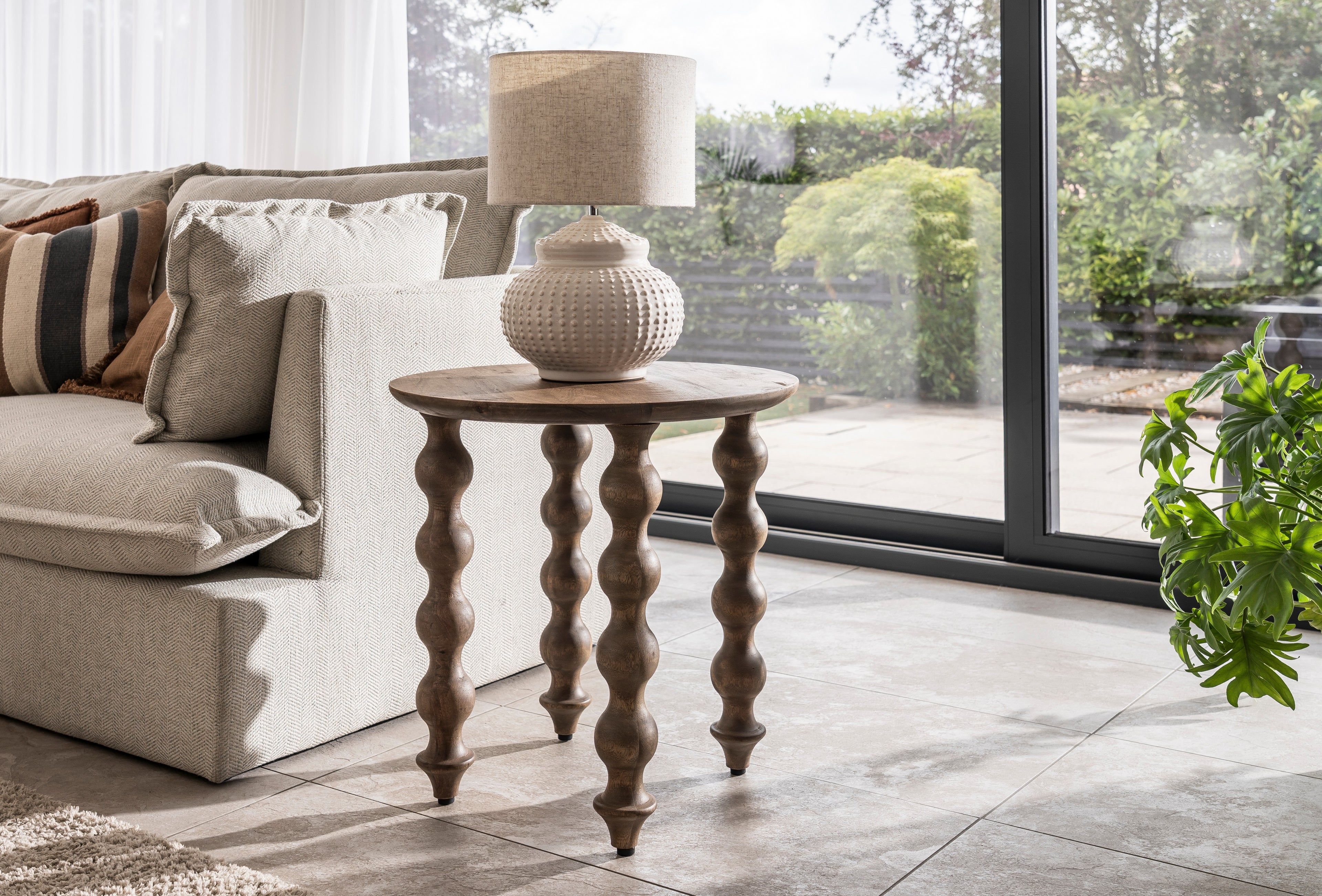 Rustic Grey Wood Round Side Table with Sculpted Spindle Legs