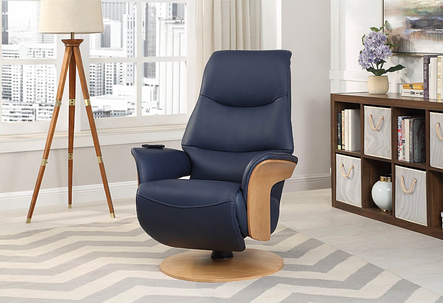 Navy Blue Leather Swivel Recliner with Integrated Footstool