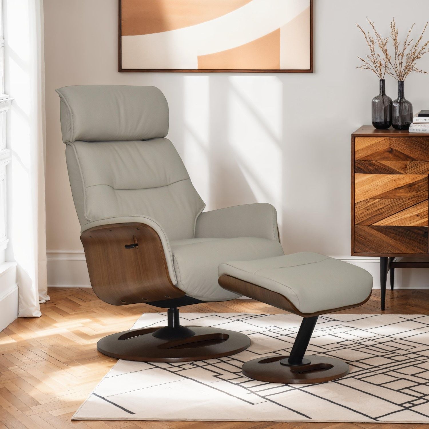 Taupe Leather Swivel Recliner with Integrated Footstool