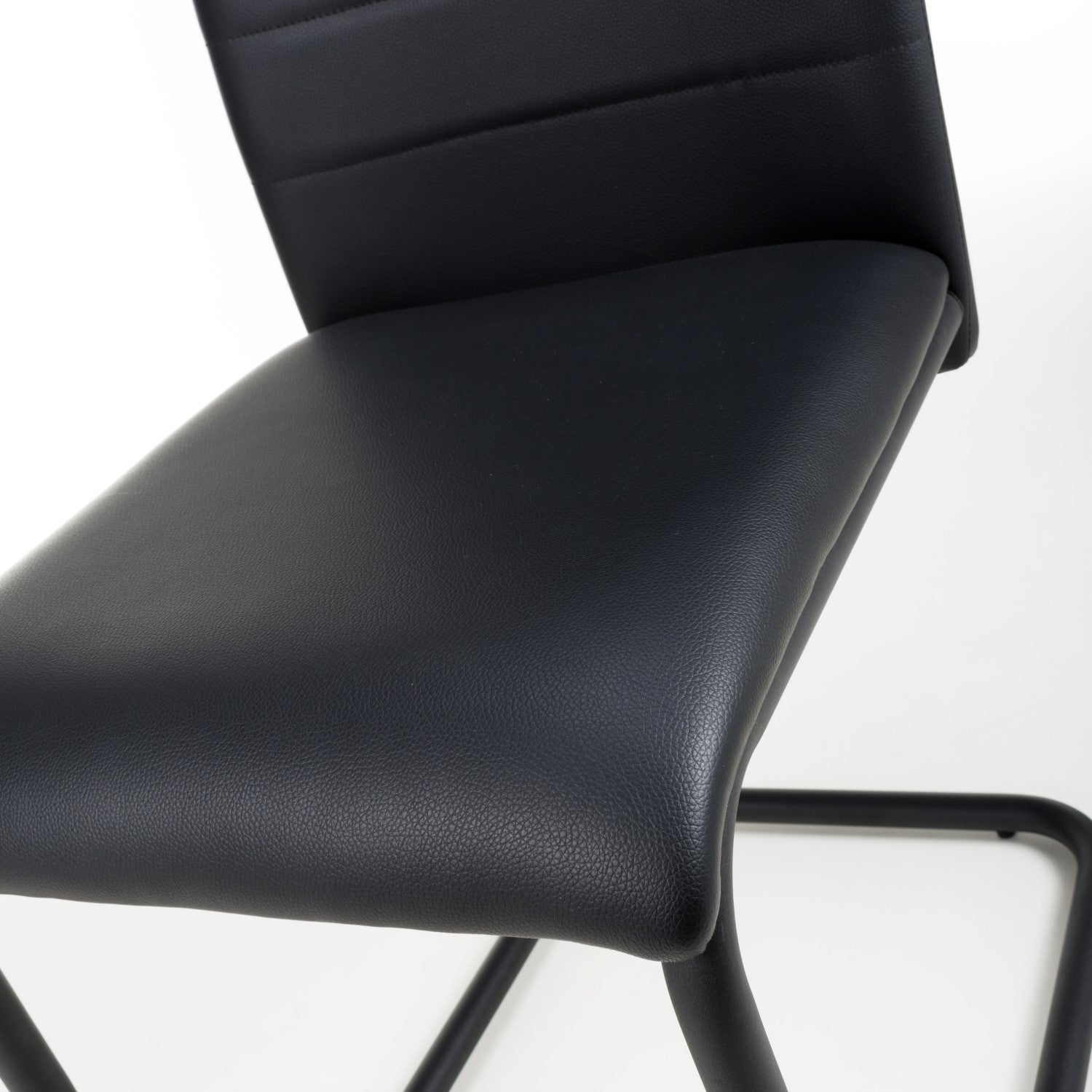 Black Leather Curved Back Cantilever Dining Chair - Home Furniture Interiors