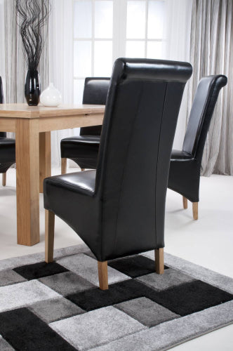 Black Leather Roll Back Dining Chair - Home Furniture Interiors