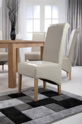 Cream Leather Roll Back Dining Chair Oak Legs